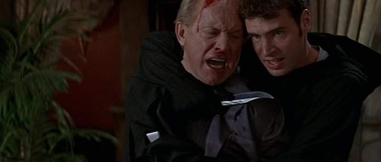 John Milton (Lance Henriksen)